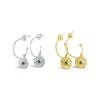 My tiny eye earrings